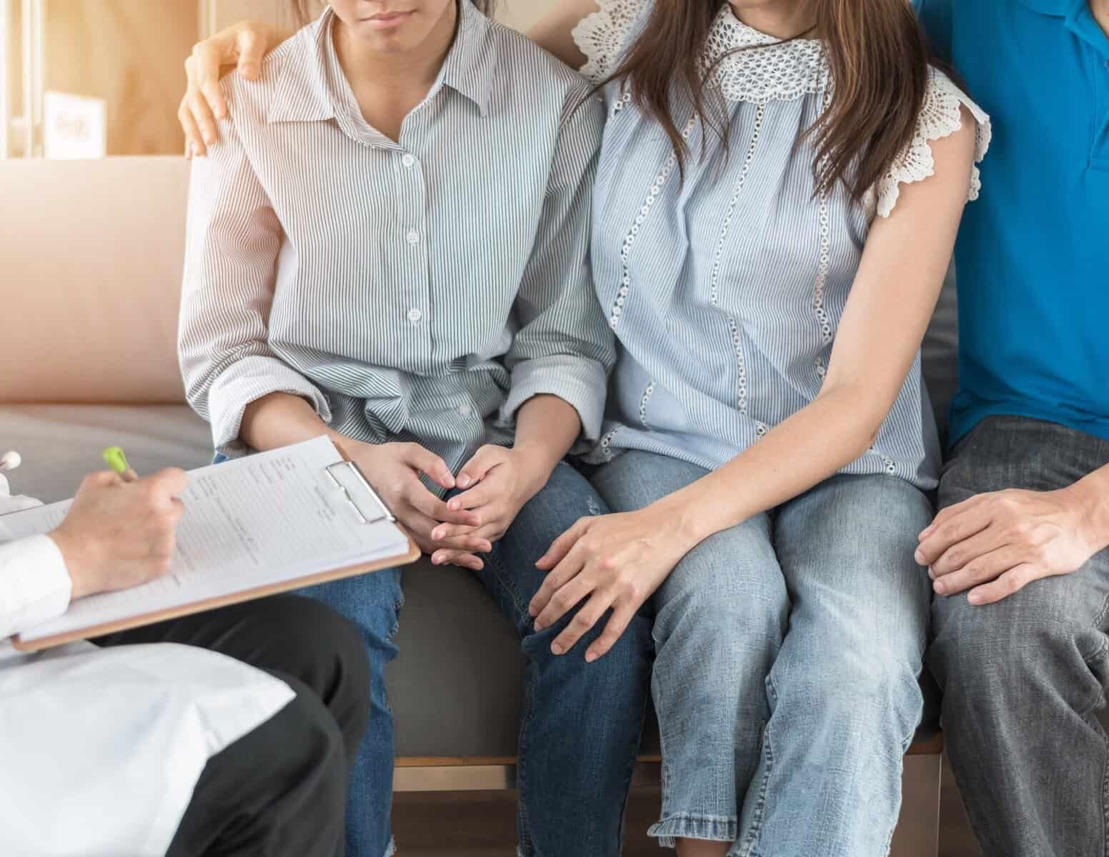 A family participating in family therapy